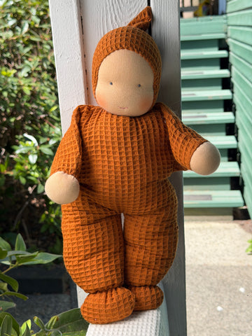 Snuggle Doll - Orange Waffle (sunkissed skin tone)